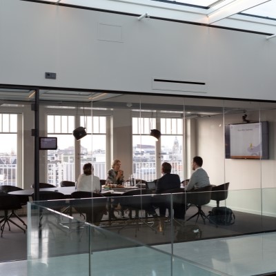 Executives in board room image